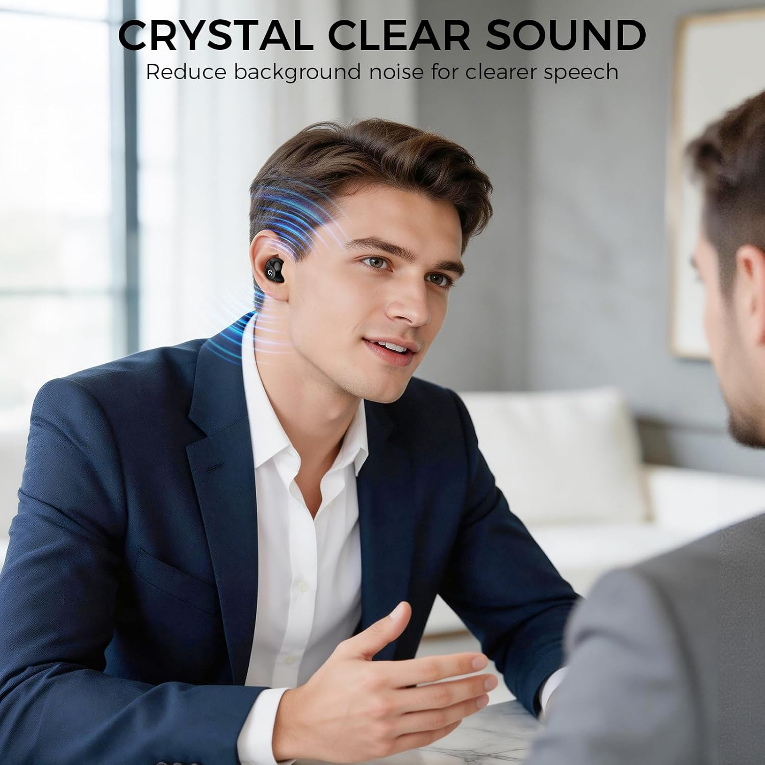 Person using discreet black hearing aid during a conversation